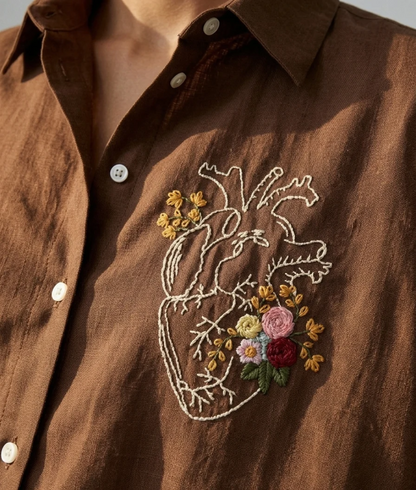 Heart in Bloom brown cotton linen shirt with floral heart embroidery – detail view