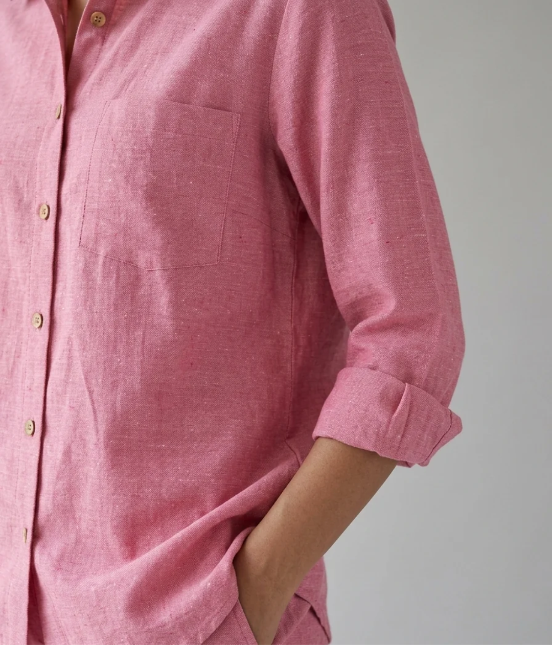 Rose Ease pink cotton linen slub shirt co-ord set – close-up of slub fabric, buttons, chest pocket and rolled cuff