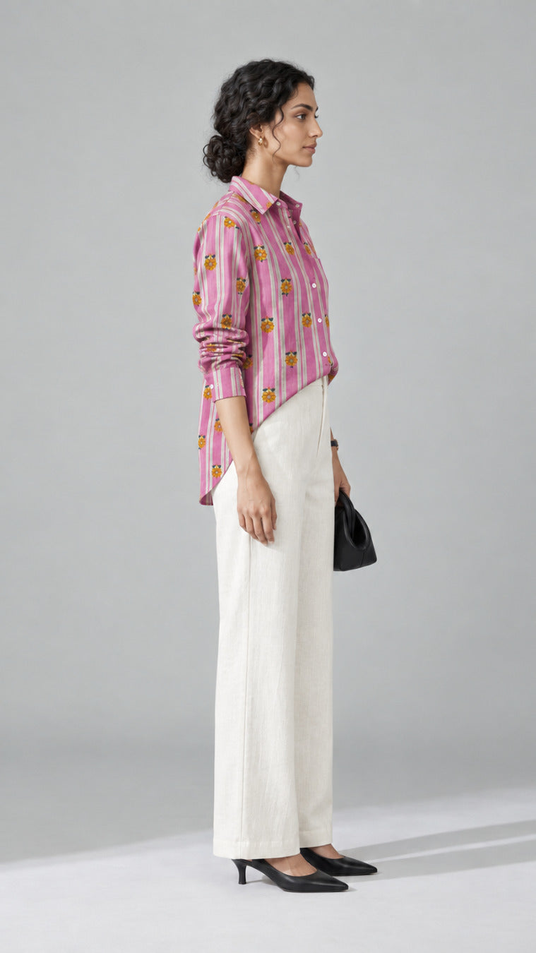 Yellow Flower Print cotton shirt, three-quarter view showing the curved shirt-tail hem